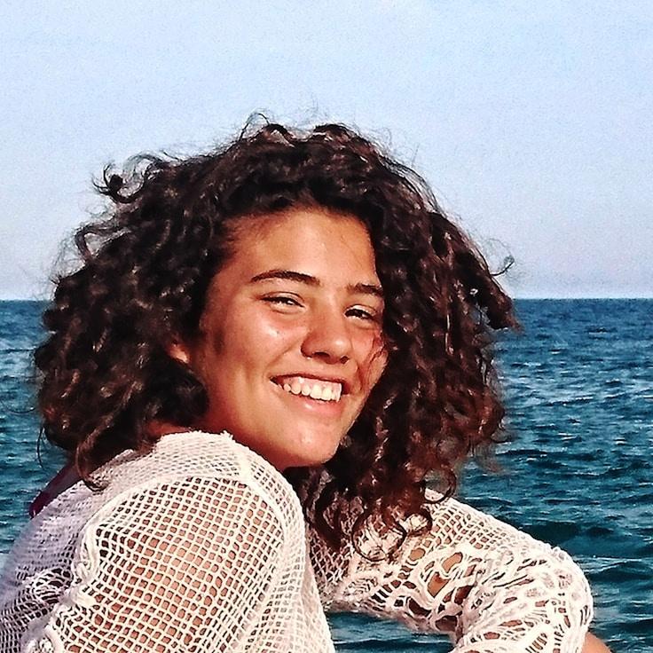 Amir Chen, Client Relations Director, discussing corporate gifting strategy with business clients